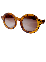 Retro-style leopard print kids sunglasses with round frames and tortoiseshell pattern.