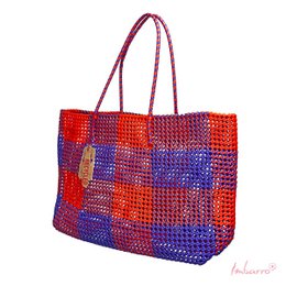  Purple orange color-block shopping tote bag with textured woven material and dual handles