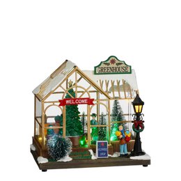 Miniature winter greenhouse with wooden frame, welcome sign, Christmas trees, and other decorative elements. Dimensions: L21 x W14 x H20 cm.