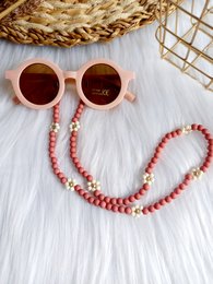 Sunglasses cord with daisy-patterned beads in terra-rose color, suitable for kids.
