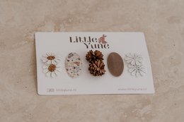  A set of 5 colorful hair clips for kids, featuring a variety of natural elements like pinecones, acorns, and flowers.