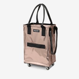  A small rose gold shopping bag with a built-in cover. The bag has a rectangular shape and is made of a durable, water-resistant material. It features black handles and accents, providing a stylish and practical design.