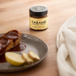Caramel spread with lemon and ginger flavors, 120g jar.