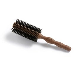 Large diameter round blow drying brush with pure boar bristles for hair styling.