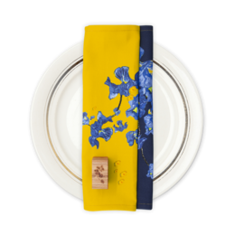 Two blue and yellow tea towels with a floral design featuring blue flowers against a yellow background.