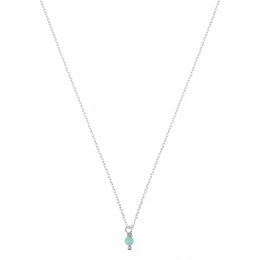 Libra zodiac sign gemstone necklace, a delicate silver chain with a small green gemstone pendant representing the Libra constellation.