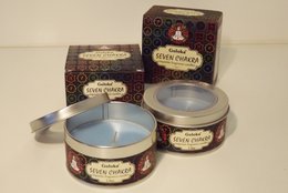 Scented candle with 7 chakra design, round shape, made of wax material, available in multiple sizes.