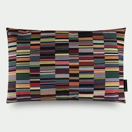 Rectangular decorative pillow with a multicolored striped jacquard pattern in shades of red, brown, yellow, and green. The pillow has a dark background and measures approximately 60cm x 40cm.