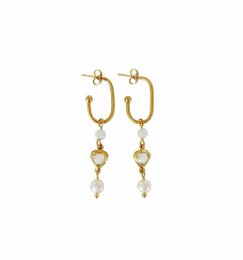 Gold-toned pearl and moonstone earrings with dangling pearl accents.