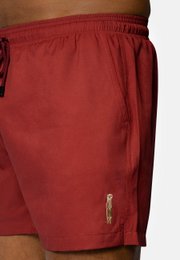  Red swim shorts with drawstring waist, suitable for men's swimwear.