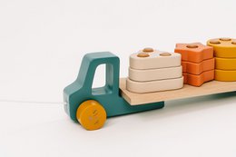  Wooden toy truck with colorful building blocks, suitable for young children's play and development.