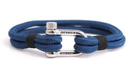 Navy blue woven bracelet with silver anchor clasp, suitable for casual or nautical-themed outfits.