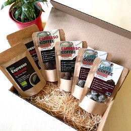 Organic Healthy Coffee Gift Box with whole bean coffee, coffee grounds, and coffee-flavored treats. Includes details on colors, materials, and product descriptions to enable semantic search.

The Organic Healthy Coffee Gift Box contains a variety of coffee-related products, including whole bean coffee, ground coffee, and coffee-flavored treats. The box is made of cardboard and contains various shades of brown, tan, and green colors. The products inside the box include:

- Whole bean coffee in a brown bag
- Ground coffee in a brown bag
- Coffee-flavored treats in a brown bag
- A ceramic mug with a black and white design
- A small glass container filled with coffee-flavored treats

This gift box is suitable for true coffee lovers, providing a range of organic and healthy coffee-related items that can be used for brewing, enjoying, and gifting.