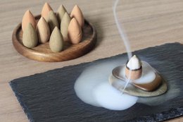 Incense landscape backflow incense holder, ceramic, round, white, smoke, stones, wooden base.