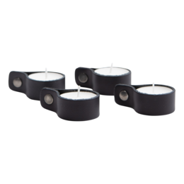 Set of 4 leather tealight candle holders in black, panther, cognac, and brown colors. Cylindrical shape with textured leather exterior.