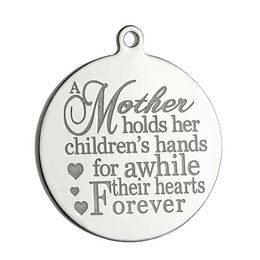 A round pendant with the text "A Mother holds her children's hands for awhile, their hearts Forever" and the brand name "PINKIEZZ 316 STEEL" engraved on it. The pendant appears to be made of stainless steel and is designed as a sentimental piece for mothers.