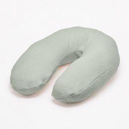 Light green nursing pillow with soft dot pattern. Filled with EPS beads or fiber balls for firm yet soft support that conforms to body shape.