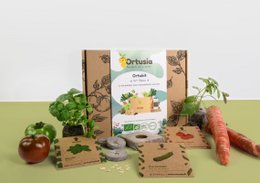 The aperitif kit contains a variety of organic ingredients including herbs, spices, and vegetables. The kit includes items like carrots, tomatoes, and herbs, which can be used to create a delicious and healthy aperitif.