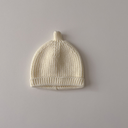 Cozy knit hat in a variety of colors including blue, yellow, black, pink, beige, white, red, dark gray, and green. Made of soft, warm material perfect for keeping little ones warm in the colder months.