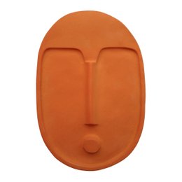 Terracotta orange abstract ceramic wall decoration mask with minimalist face design. Suitable for modern home decor.