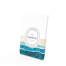 Scented sachet with citrus fragrance from the Valencia Collection. Room spray with a rectangular shape and blue and white packaging design.