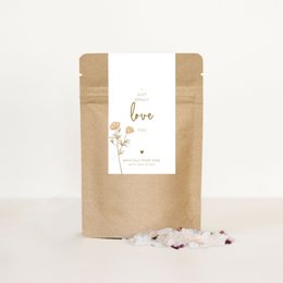  Relaxing bath salts with a natural, earthy scent and a mix of pink and white crystals. Ideal for a soothing, rejuvenating bath experience.