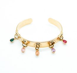  Gold-plated ring with charms in various colors and shapes, including hearts and gems.