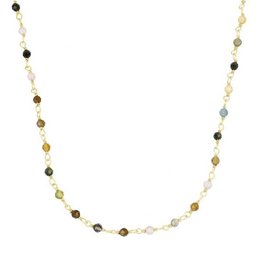 A delicate necklace featuring a mix of turquoise, black, and gold-toned beads strung together on a chain.