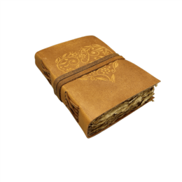 Leather embossed journal with antique-style pages, 18x12.5 cm in size, suitable for writing, sketching, or recording thoughts.