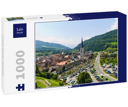 A 1000-piece puzzle depicting the scenic town of Gmünd in Carinthia, Austria, with its historic buildings, church spire, and surrounding mountainous landscape.