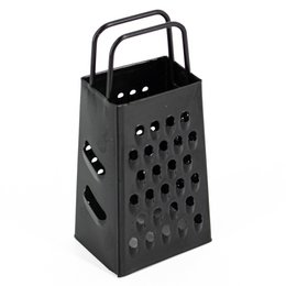 A black metal grater with a perforated surface and a handle for grating and shredding food items.