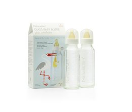 Set of two clear glass drinking bottles for kids, 240 ml capacity, with yellow silicone nipples.