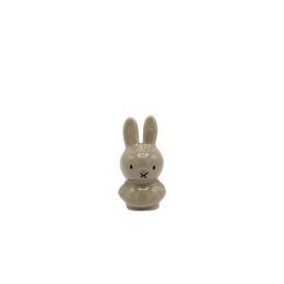  Small gray rabbit figurine with long ears and a simple design.