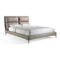 Bed upholstered in leatherette with cushions