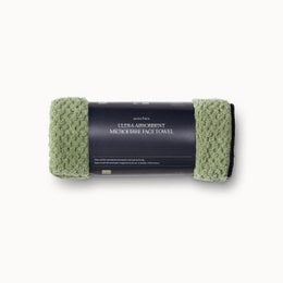 Green waffle weave hand towel, ultra-absorbent microfiber fabric, textured surface design.