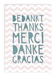 Multicolored thank you greeting card with text "Bedankt Thanks Merci Danke Gracias" on a chevron pattern background.