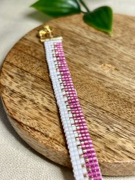  Bracelet with miyuki beads in pink and white colors, featuring a rectangular shape and a metal clasp.
