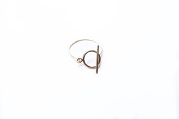 Gold plated ring with a circular design, suitable for wedding or engagement.

The gold plated LUCY ring features a circular design with a simple, elegant style. The ring is made of a gold-toned metal and has a smooth, polished finish. It would be suitable for a wedding or engagement, with its classic and timeless appearance.