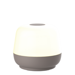 Taupe table lamp with round dome shape, cream white diffuser, modern minimalist design, warm ambient lighting.