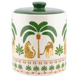 Ceramic storage jar with palm tree and cheetah print design. Cream-colored base with green lid and accents. Suitable for storing dry goods, spices, or other kitchen items.