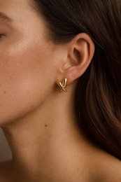  Gold-colored stainless steel drop earrings, minimalist curved wave design, hypoallergenic jewelry for women