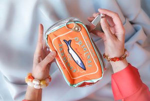 Toilet bag sardines in canned orange