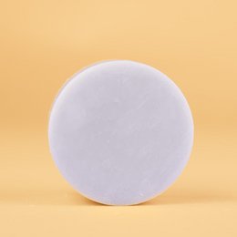 Lavender-scented conditioner bar made with natural ingredients for gentle hair conditioning.