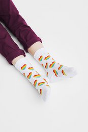 Organic children's socks with rainbow hearts, available in sizes 2/3Y, 4/6Y, and 7/9Y. The socks feature a colorful rainbow heart pattern.
