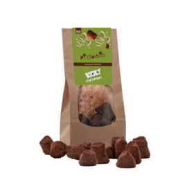  Pistachio-chocolate truffles, 130g. Gourmet pralines with a rich, creamy chocolate filling and a dusting of cocoa powder.