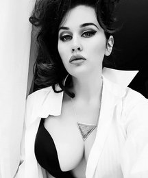 Large, oxidized silver, golden-plated pendant with a triangular shape and intricate detailing.