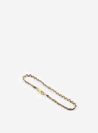 14 karat gold charm bracelet with cotton accents, available in natural and black colors.