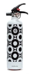 A black and white fire extinguisher with a modern, geometric design. The fire extinguisher has a cylindrical shape and features a repeating pattern of circles and ovals.