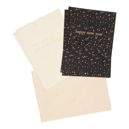  Set of 4 Happy New Year greeting cards made of lokta paper with a black background and gold foil stars.