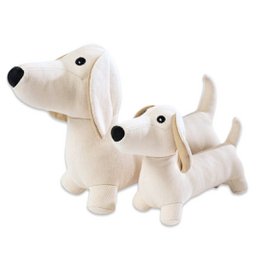  Soft, plush dog toys in small and large sizes. Realistic design with floppy ears and cute expressions. Perfect for playtime and cuddling.